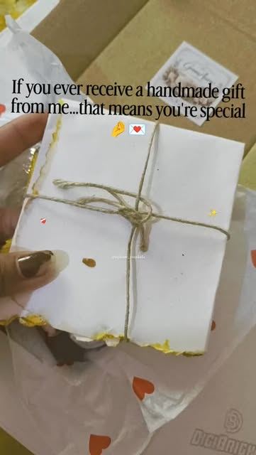 Handmade paper gift tied with twine